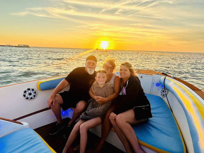 family-on-chadillac-adventures-boat-sunset-clearwater-beach