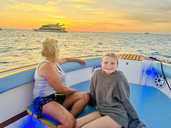 mother-and-child-sunset-off-clearwater-beach-chadillac-adventures-boat