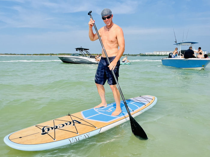 paddleboarding-off-boat-in-clearwater