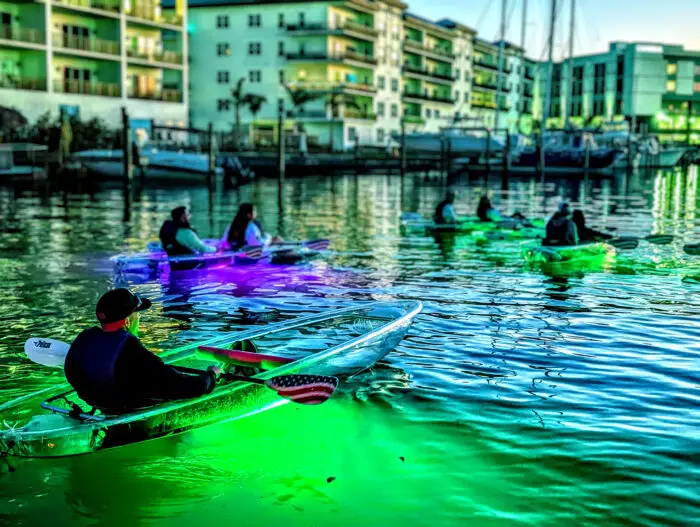 group-of-led-light-kayaks-in-harbor-gloflo-kayaking-toursjpg - Chadillac Adventures